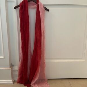 Women’s salmon and light pink colored scarf